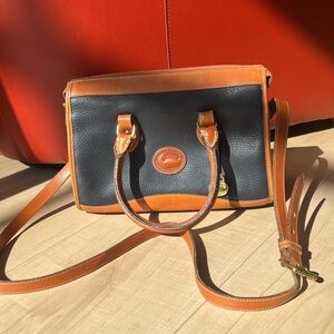 DOONEY & BOURKE vintage dark blue satchel with dual handles and adjustable strap